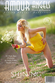 Stunning blonde cutie starts with posing in yellow dress then gets rid of it very willingly.