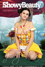 Watch as this cute and incredibly sexy black haired girl drops off her sexy yellow dress to pose naked for the camera.