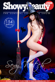 Amazing long haired witch in a hat and white socks showing shaved quim and fantastic butt.