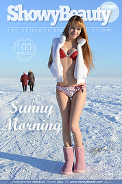 Fascinating charmer undressing and showing tempting body outdoor right on the winter snow.